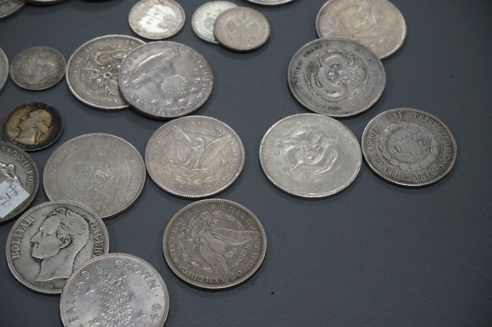 A collection of Chinese, France, Italy silver and coins and other world silver coins, late 19th/20th century